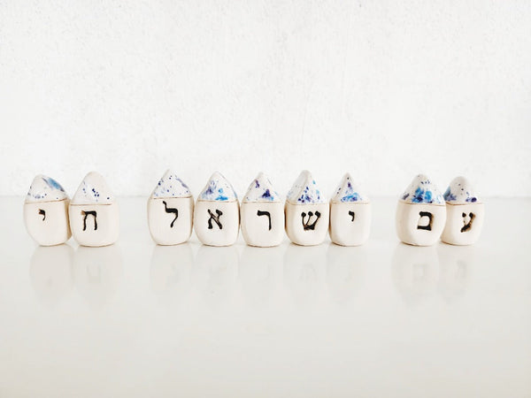 Ceramuc miiniature houses with Hebrew letters