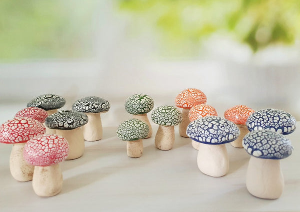 Miniature ceramic mushrooms