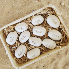 Spiritual gift from Israel – handmade ceramic stones with engraved Hebrew words for blessing and protection
