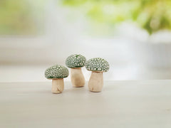 Miniature mushrooms in blue and white