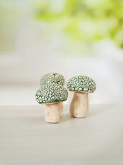 Miniature mushrooms in blue and white