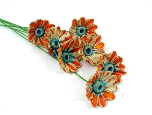 Orange and turquoise ceramic flowers