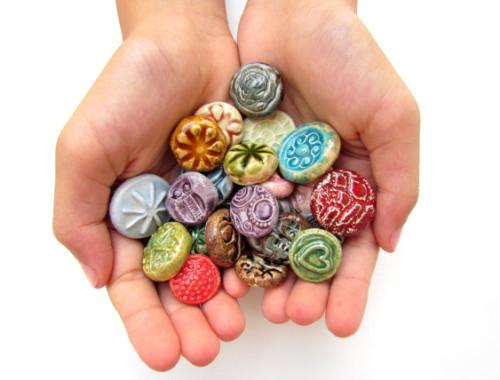 Round cabochons and tiles in variety of colors and designs
