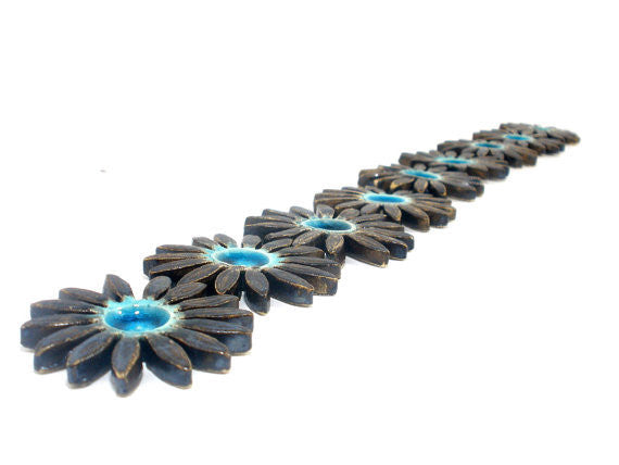 Turquoise and brown ceramic flowers