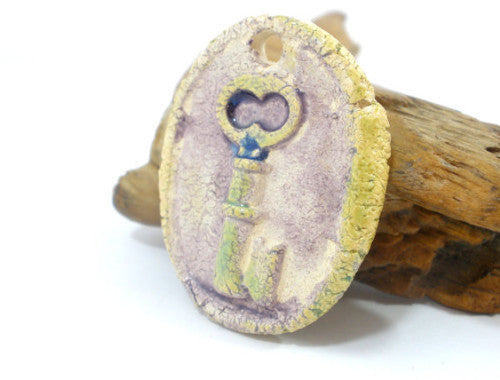 Key pendant A stylish and OOAK ceramic pendant in shades of purple and green